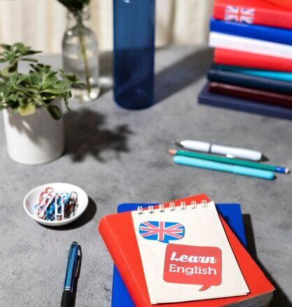 english-book-resting-table-working-space_23-2149429576.jpg